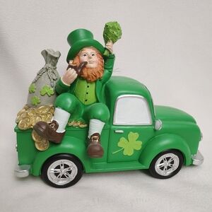 Green Leprechaun Truck Figurine with Shamrock and Gold Coins 9"X10"
